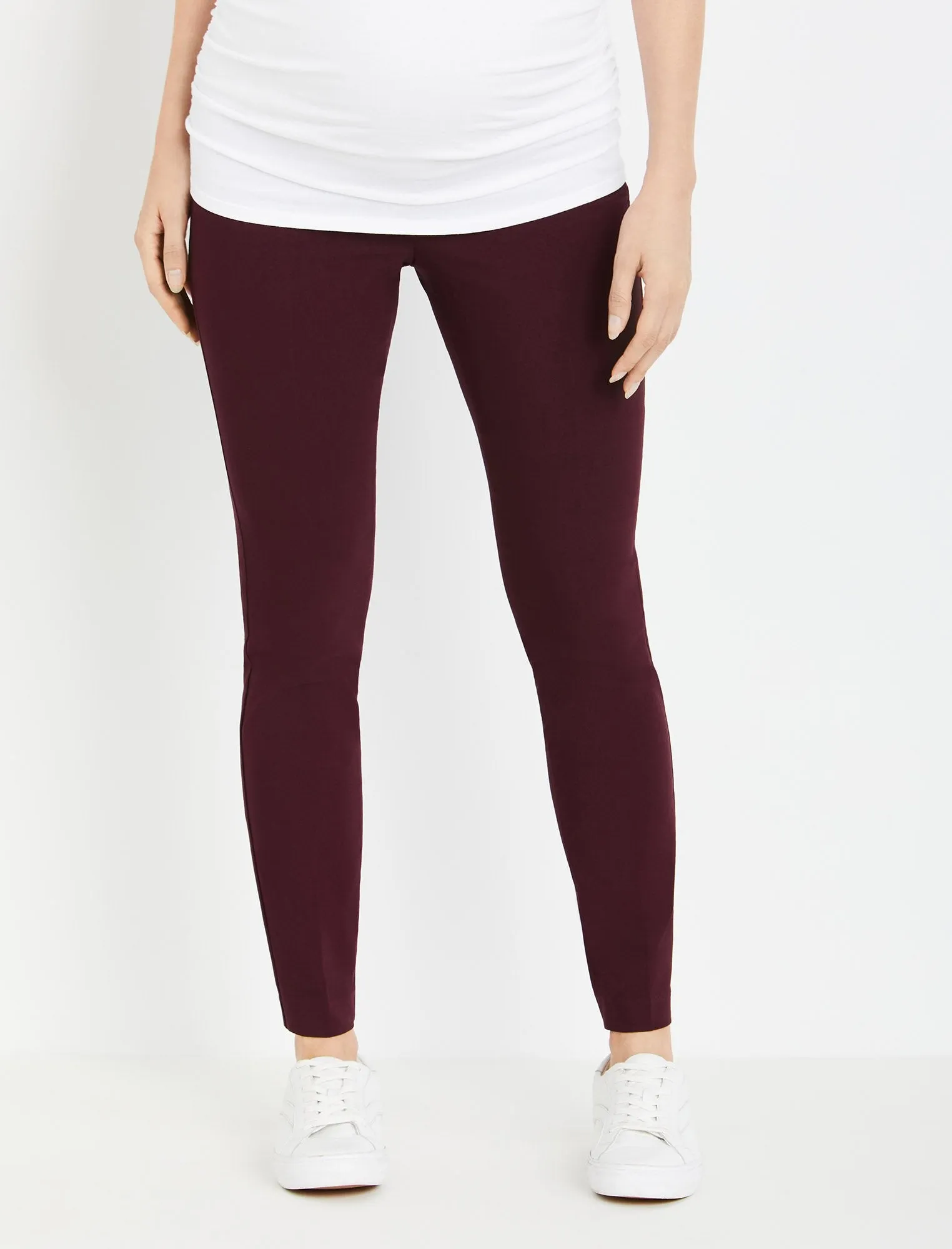 The Maia Secret Fit Belly Skinny Ankle Maternity Pants in Burgundy